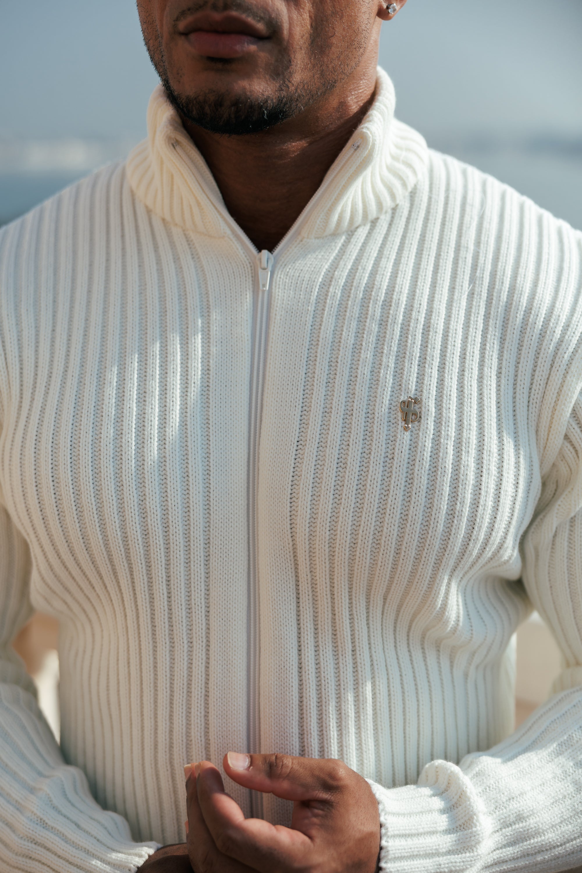 Chunky Cream Ribbed Zipped Cardigan with Gold Emblem- FSJ096