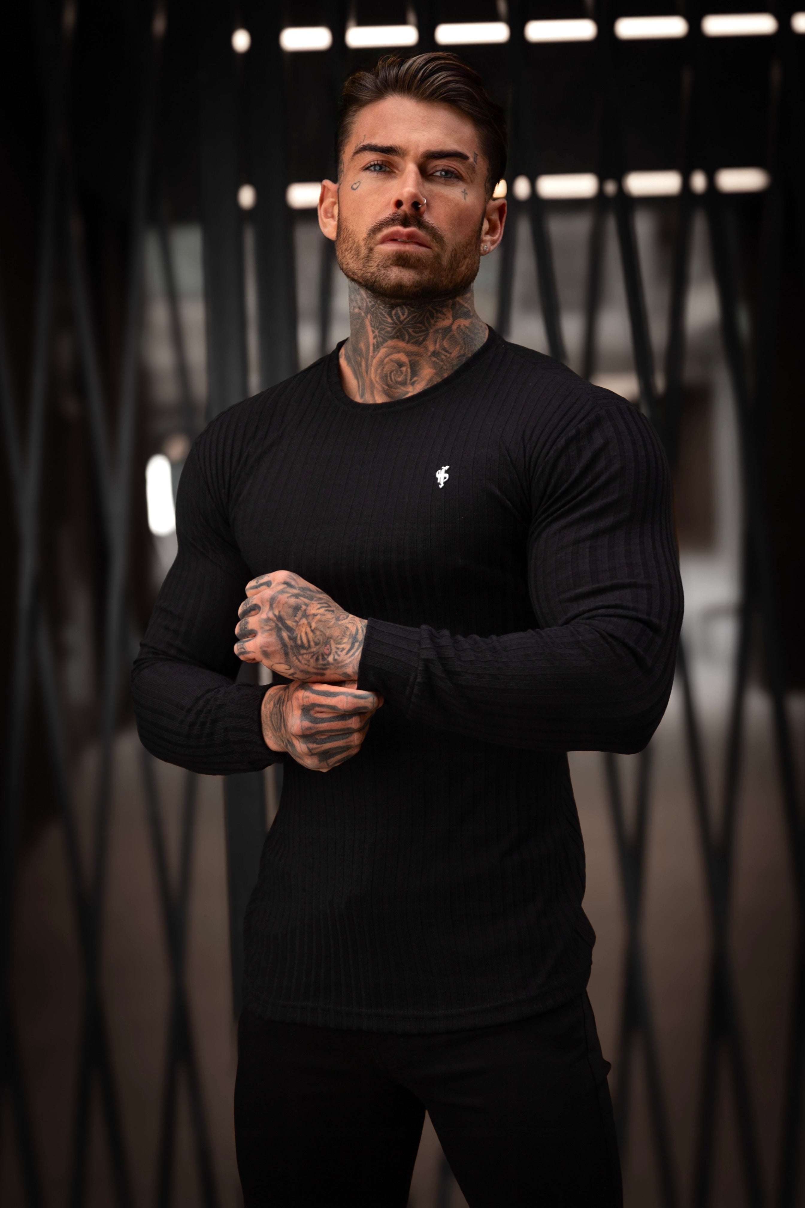 Classic Black Ribbed Knit Jumper With Silver Metal Emblem - FSH941