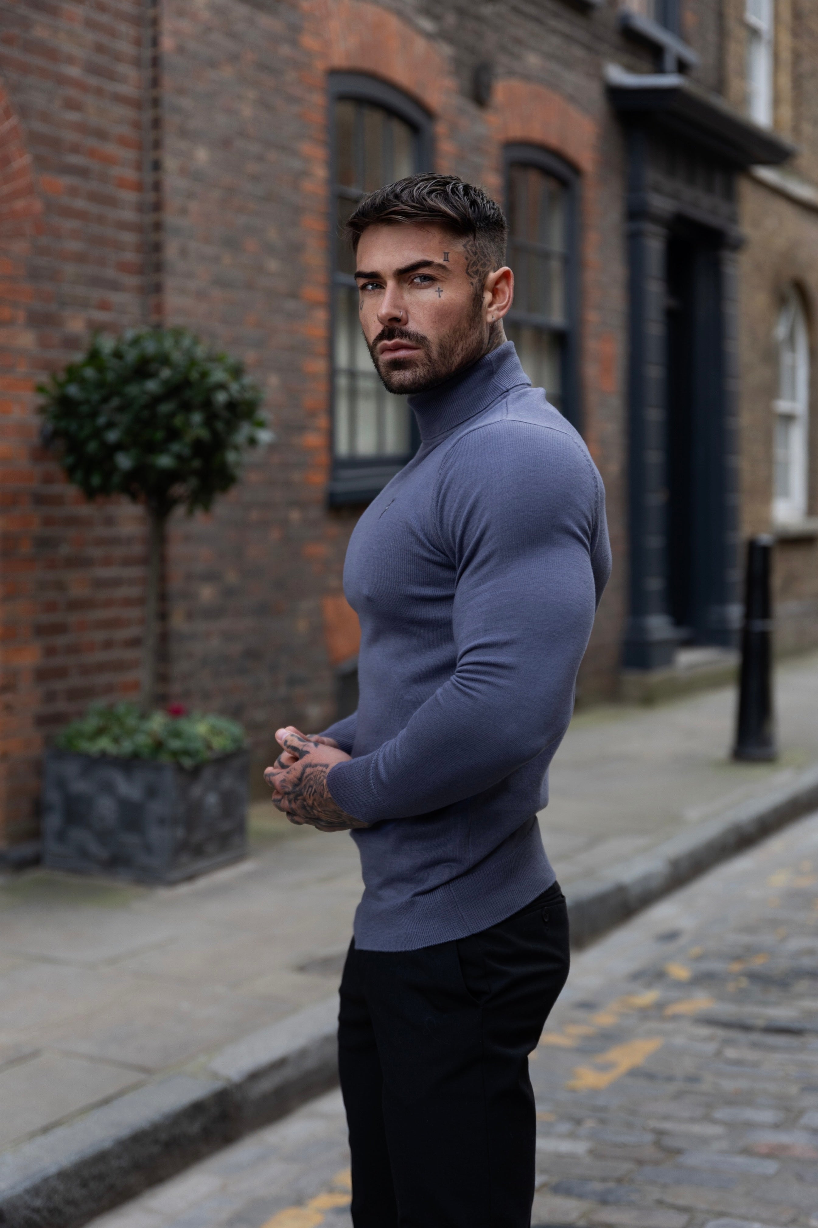Classic Gunmetal Roll Neck Knitted Jumper With Tonal Emblem - FSN137