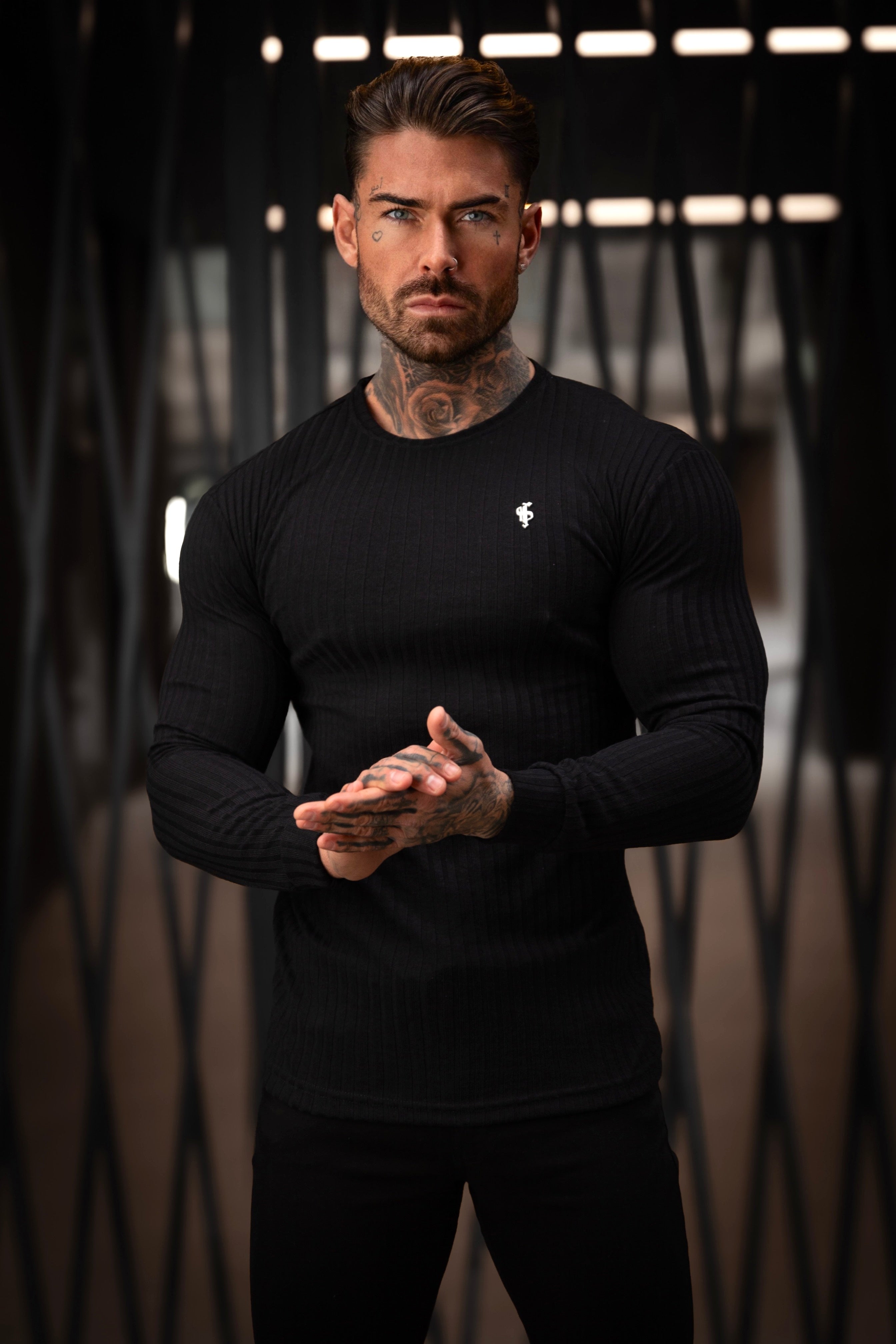 Classic Black Ribbed Knit Jumper With Silver Metal Emblem - FSH941