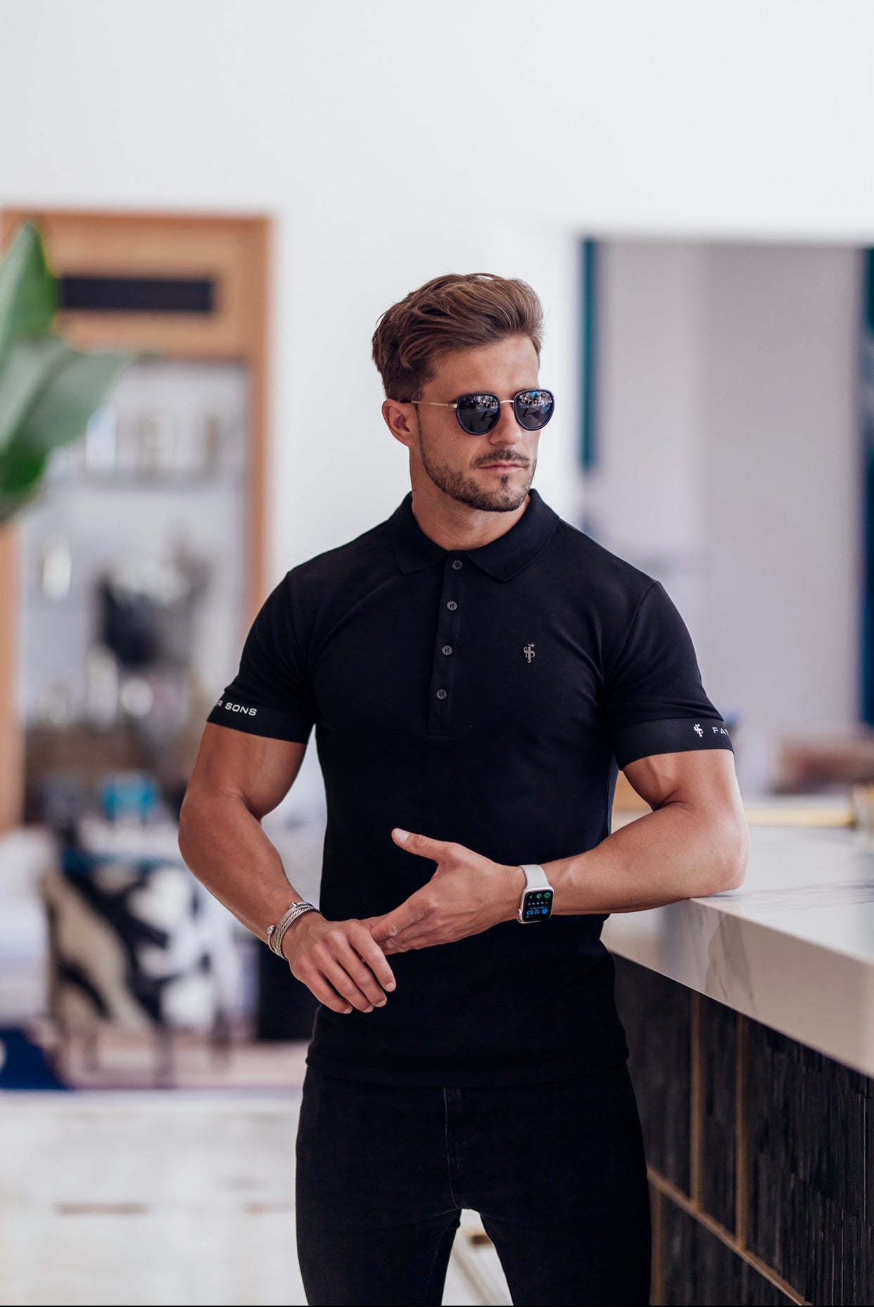 Classic Black Polo with FS Elastic Sleeve Branding and Black Metal Emblem - FSH631
